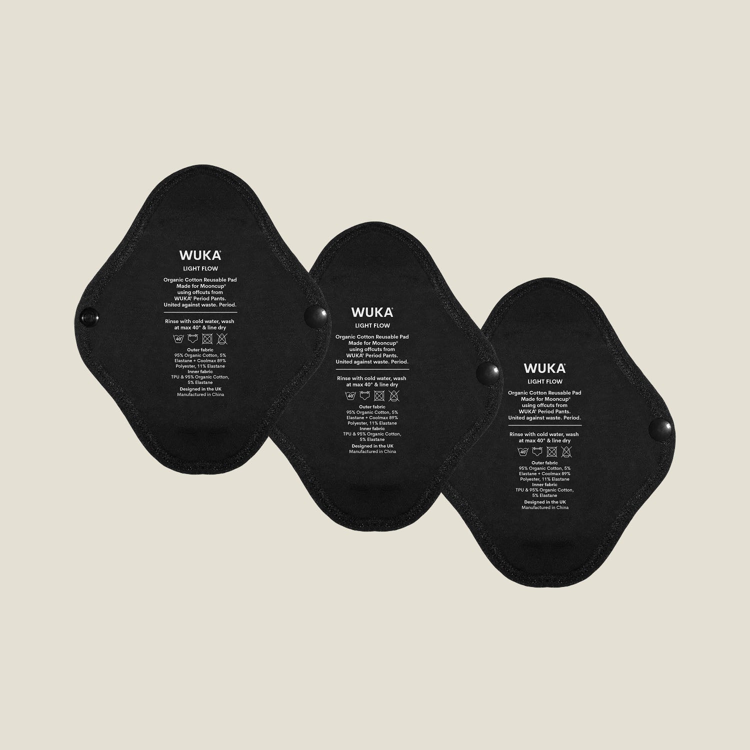 Three WUKA x Mooncup reusable panty liners for light flow, made with GOTS-certified organic cotton and designed for secure, sustainable period care.
