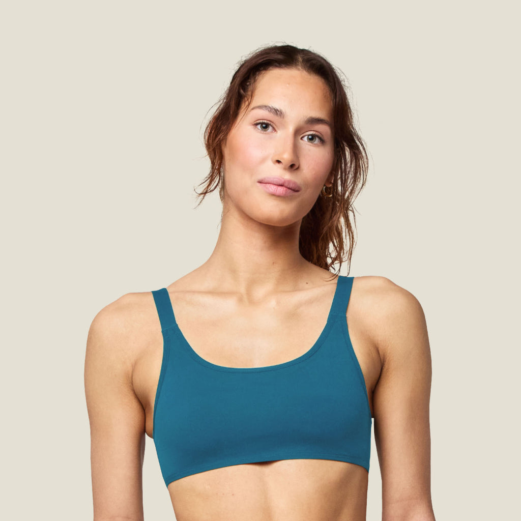 Teen Swim Bikini Top in Blue shown from the front, featuring a sporty scoop neckline and comfortable fit for active water play.
