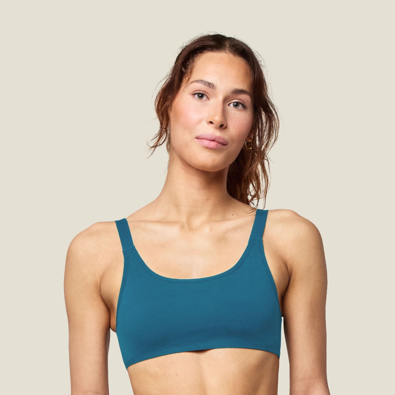 Teen Swim Bikini Top in Blue shown from the front, featuring a sporty scoop neckline and comfortable fit for active water play.
