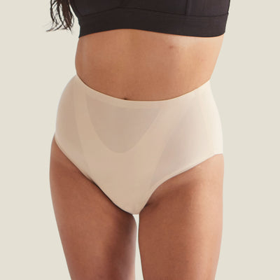 Close-up of WUKA Drytech™ Midi Brief in Light Nude showing leak-proof front panel for light incontinence protection.