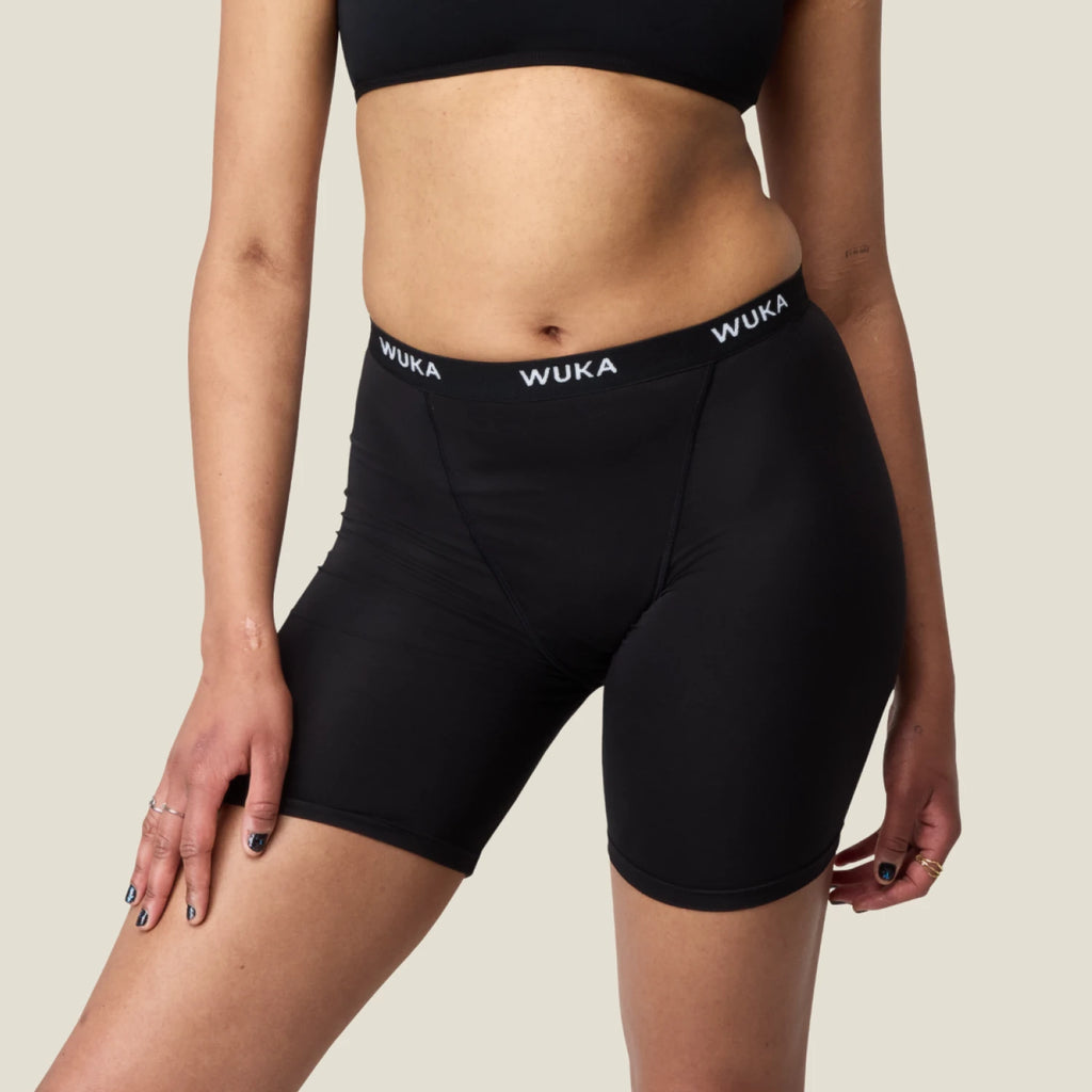 Front close-up of WUKA Ultimate™ Boxer Period Shorts for medium flow, featuring sleek design, moisture-wicking fabric, and supportive waistband for secure period wear