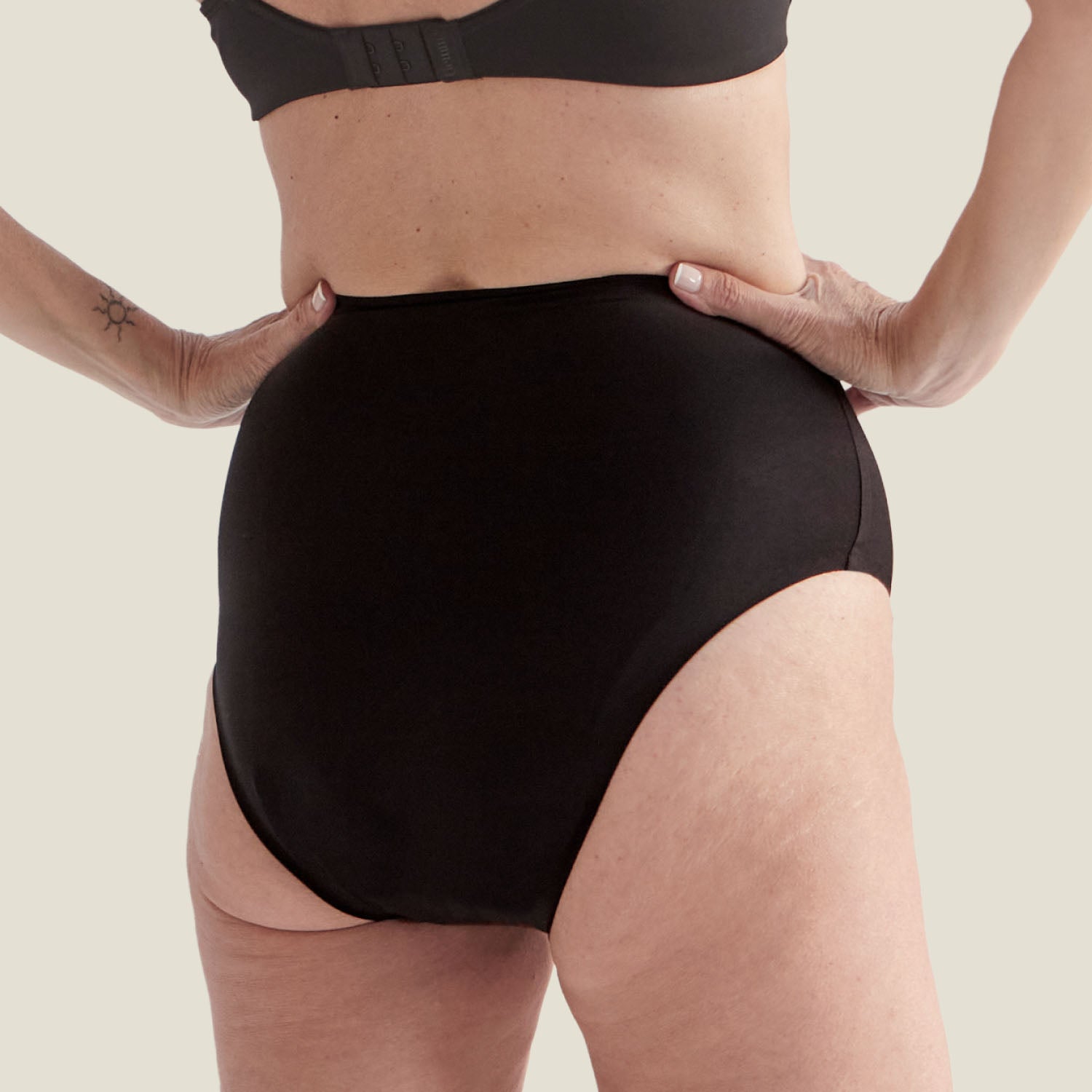 Back view of the Drytech™ High Waist Incontinence Brief in black, highlighting full coverage and discreet protection.