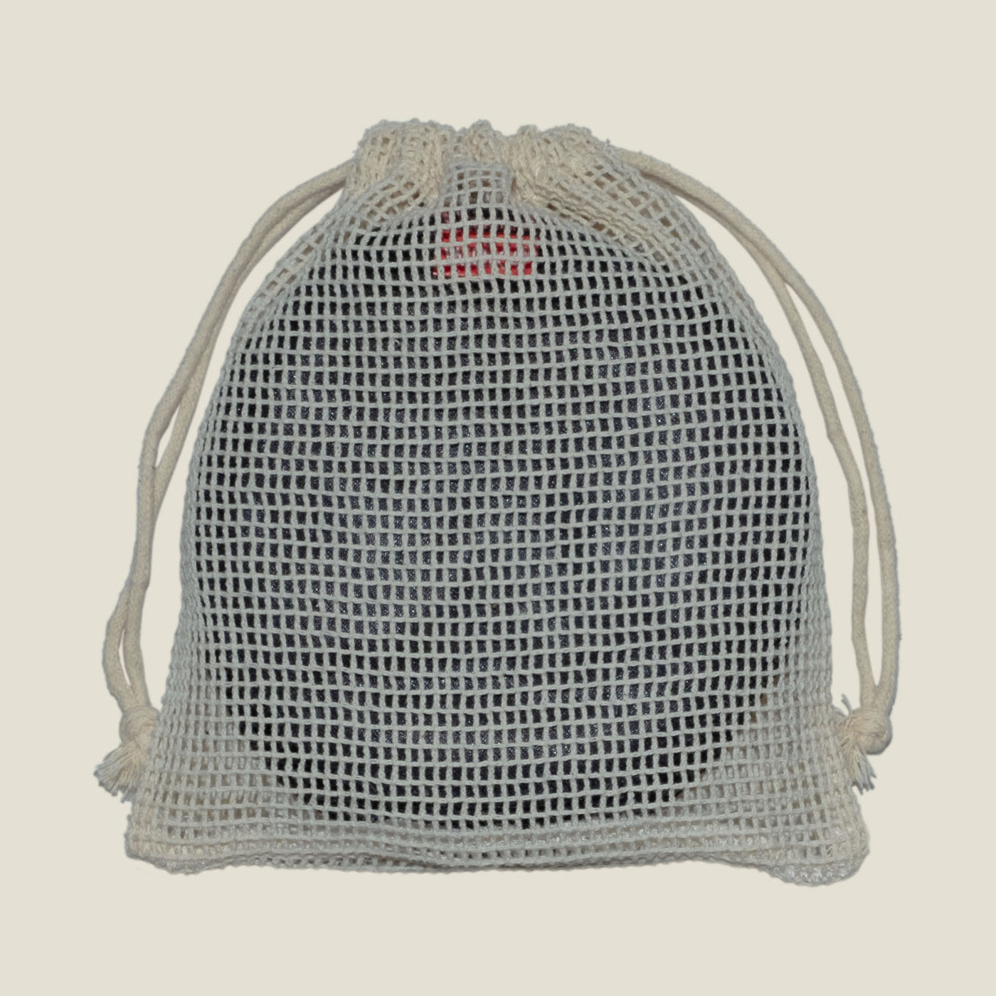 WUKA Nursing Pads neatly packed inside reusable mesh laundry bag, showcasing convenient storage and travel solution.