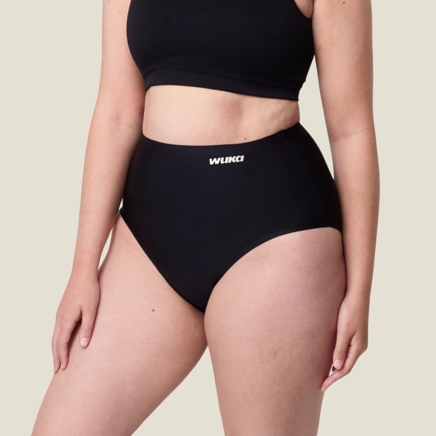 Side view of WUKA Stretch Seamless Period Underwear – black high-waist for medium menstrual flow.