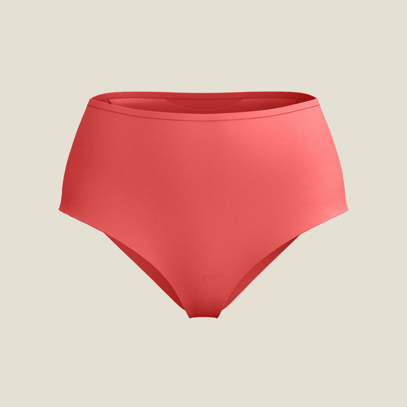 WUKA Drytech™ High Waist Brief in Coral Pink laid flat, highlighting its smooth fabric and high-rise fit.