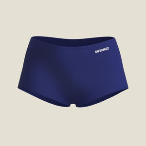 Flat lay of WUKA Teen Stretch™ Boxer Short in navy, designed for heavy flow with seamless construction and high absorbency core.