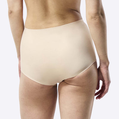 WUKA Stretch Period Short Adult Style Heavy Absorbency Light Nude Colour Back Size 1