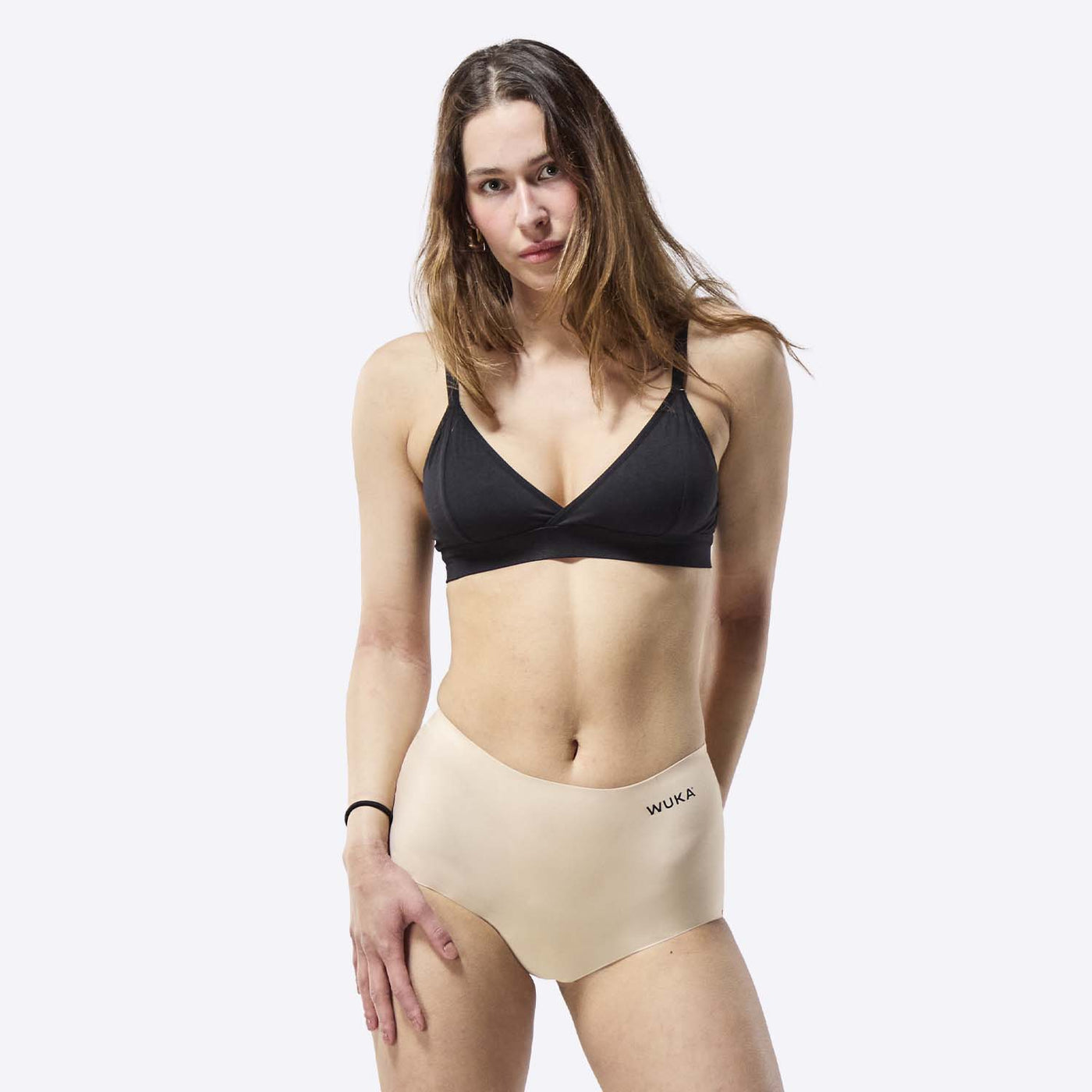 WUKA Stretch Period Short Adult Style Heavy Absorbency Light Nude Colour Three Quarter Front Size 1
