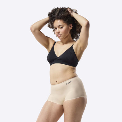 WUKA Stretch Period Short Adult Style Heavy Absorbency Light Nude Colour Three Quarter Front Size 2