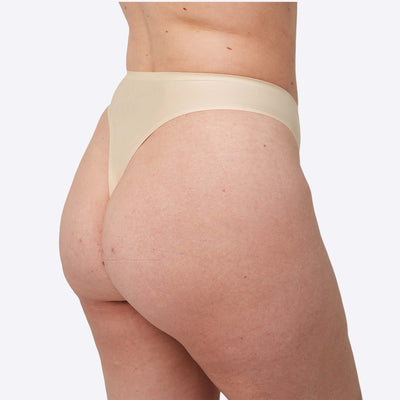 WUKA Stretch Thong Style Light to Medium Absorbency Light Nude Colour Side Size 2