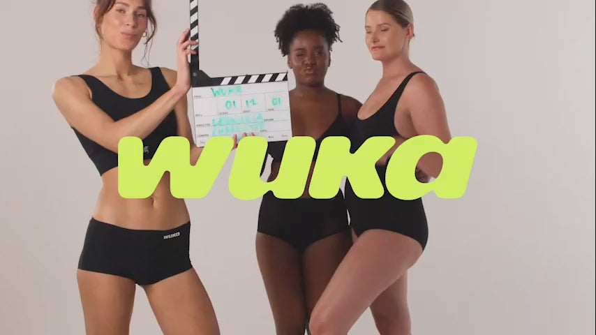 An animated video guide showing how many pairs of WUKA period pants you need for a full cycle. Friendly on-screen text explains that most people start with 3 Heavy Flow pairs to build confidence, then add Medium or Super Heavy for lighter or heavier days. Step-by-step visuals show sets of 3, 5 and 7 pants covering an entire week without urgent washing. Diverse models demonstrate different WUKA styles—Teen Stretch, High Waist, Bikini and Shorts—across school, sports, work and bedtime routines. 